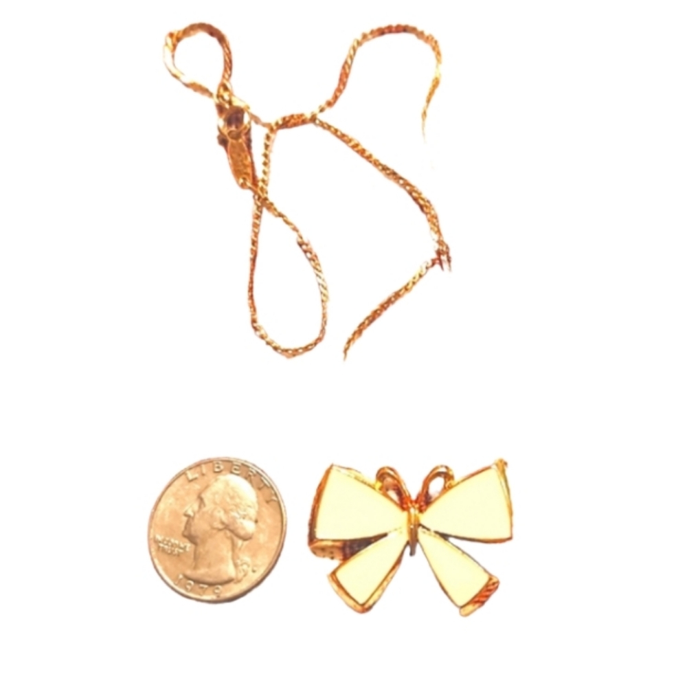 Vintage cream enamel gold toned butterfly necklace. 70s?